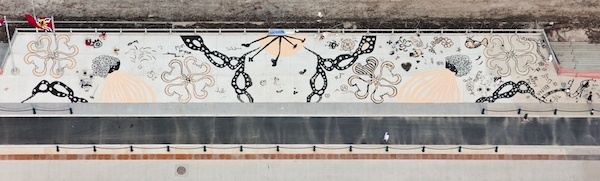 "Seed the Change" by Jessica Witte. 400-foot-long drawing with the public (middle 120 foot section). Sunflower, safflower and millet seed. Arch riverfront, St. Louis, 2016. 