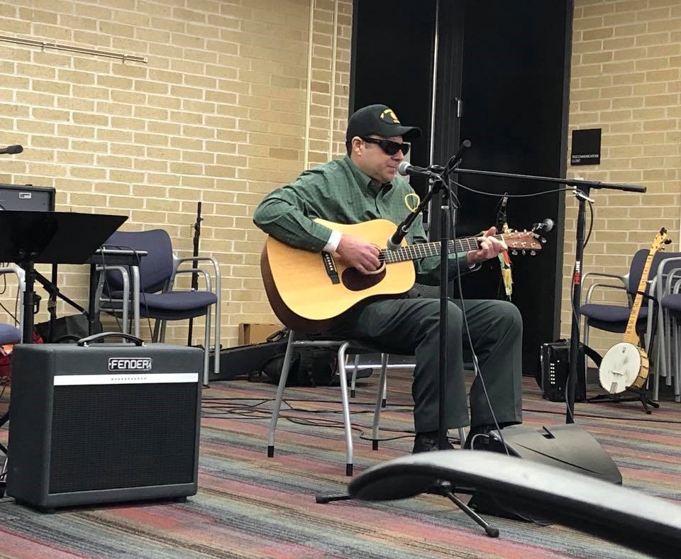 Veteran musician Rick Milisci performing at Library Live.